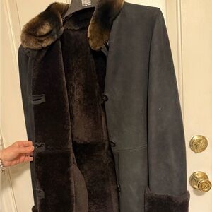 3/4 Coat black shirling , brown collar and pulse  trim, warm and  light 
elegant